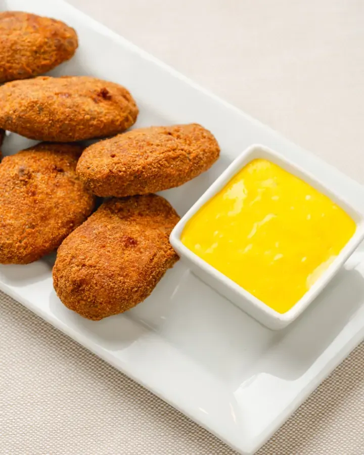 Mondeghili o Mondeghini?